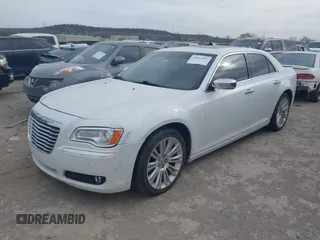 2012 Chrysler 300 with VIN 2C3CCAET1CH253300, listed as a IAAI auction lot 41827997 with 193,298 mi miles. Bid and sale history available at carsss.com. Image 2.