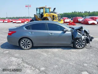 2016 Nissan Altima 2.5 SR with VIN 1N4AL3AP3GC186902, listed as a IAAI auction lot 39780328 with 142,952 mi miles. Bid and sale history available at carsss.com. Image 13.
