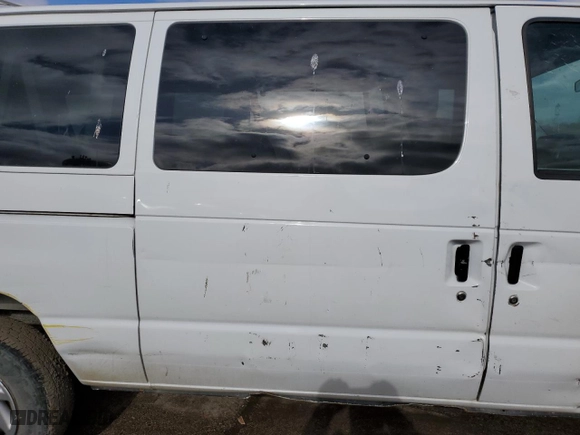 2014 Ford Econoline Wagon XL with VIN 1FBNE3BL1EDB20488, listed as a Copart auction lot 43777575 with 72,101 mi miles and Salvage Title. Bid and sale history available at carsss.com. Image 11.