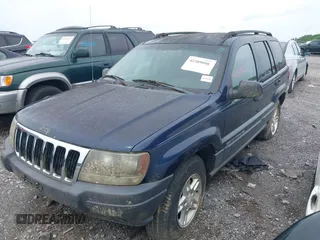 2003 Jeep Grand Cherokee Laredo with VIN 1J4GW48S63C591605, listed as a IAAI auction lot 42389898 with 177,024 mi miles and . Bid and sale history available at DreamBid. Image 2.