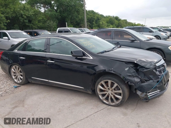 2017 Cadillac XTS Luxury z VIN 2G61M5S32H9158776, wystawiony jako IAAI lot #42528442 z przebiegiem 90 680 mil mil oraz . Historia ofert i sprzedaży dostępna na DreamBid. Obrazek 12.