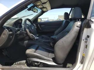 2009 BMW 1 Series 135i with VIN WBAUN93599VK40210, listed as a Copart auction lot 54166905 with 148,899 mi miles and Salvage title. Bid and sale history available at DreamBid. Image 7.