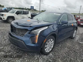 2021 Cadillac XT4 FWD Luxury with VIN 1GYAZAR40MF019280, listed as a Copart auction lot 58949595 with 32,041 mi miles and Salvage title. Bid and sale history available at DreamBid. Image 1.