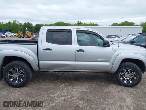 2011 Toyota Tacoma with VIN 3TMLU4EN4BM069898, listed as a IAAI auction lot 42371500 with 201,538 mi miles and . Bid and sale history available at DreamBid. Image 14.