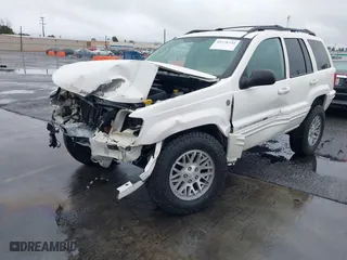 2004 Jeep Grand Cherokee Limited with VIN 1J4GW58S24C417604, listed as a IAAI auction lot 41578234 with 1 mi miles. Bid and sale history available at carsss.com. Image 2.