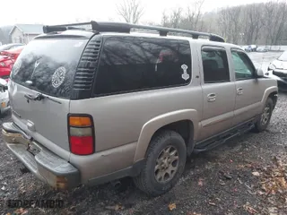 2006 Chevrolet Suburban LT with VIN 1GNFK16Z86J171637, listed as a IAAI auction lot 41919762 with 231,041 mi miles. Bid and sale history available at carsss.com. Image 4.