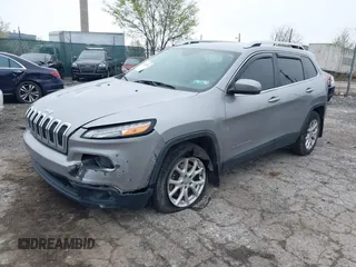2016 Jeep Cherokee Latitude with VIN 1C4PJMCB4GW183037, listed as a IAAI auction lot 42003716 with 138,843 mi miles and . Bid and sale history available at DreamBid. Image 2.