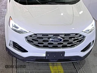 2019 Ford Edge SEL with VIN 2FMPK3J9XKBC37759, listed as a IAAI auction lot 42666643 with 103,812 mi miles and . Bid and sale history available at DreamBid. Image 26.