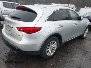 2016 Infiniti QX70 with VIN JN8CS1MU1GM671887, listed as a IAAI auction lot 41741481 with 88,547 mi miles and . Bid and sale history available at DreamBid. Image 4.