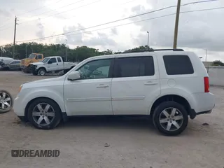 2015 Honda Pilot Touring z VIN 5FNYF4H94FB072907, wystawiony jako IAAI lot #42383169 z przebiegiem 200 040 mil mil oraz . Historia ofert i sprzedaży dostępna na DreamBid. Obrazek 14.