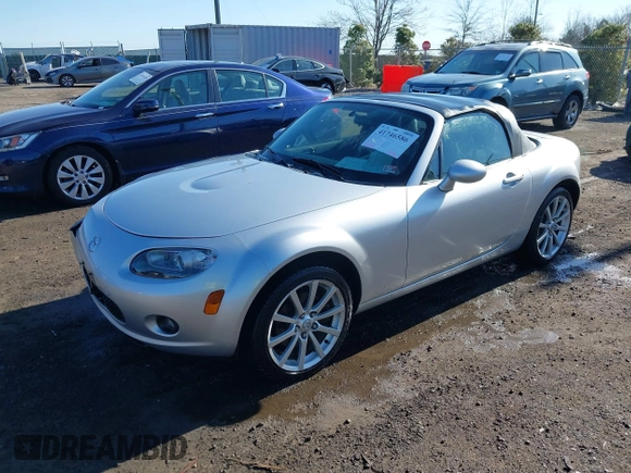 2007 Mazda MX-5 Miata Sport z VIN JM1NC25F170135777, wystawiony jako IAAI lot #41746586 z przebiegiem 107 302 mil mil oraz . Historia ofert i sprzedaży dostępna na DreamBid. Obrazek 2.