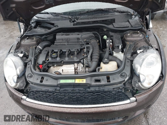 2010 MINI Hardtop S with VIN WMWMF7C50ATZ74395, listed as a IAAI auction lot 42227483 with 109,704 mi miles and . Bid and sale history available at DreamBid. Image 10.