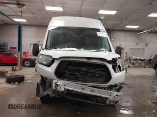 2017 Ford Transit z VIN 1FTYR3XM7HKA08504, wystawiony jako IAAI lot #41607977 z przebiegiem 621 328 mil mil oraz . Historia ofert i sprzedaży dostępna na DreamBid. Obrazek 13.