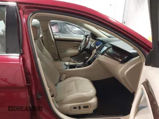 2013 Ford Taurus Limited with VIN 1FAHP2F82DG140741, listed as a IAAI auction lot 41882262 with 131,017 mi miles. Bid and sale history available at carsss.com. Image 5.