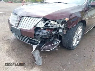 2009 Lincoln MKS z VIN 1LNHM93R09G612169, wystawiony jako IAAI lot #42126437 z przebiegiem 158 393 mil mil oraz . Historia ofert i sprzedaży dostępna na DreamBid. Obrazek 6.