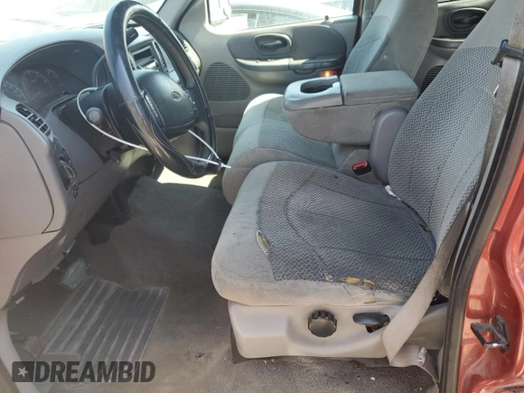 2001 Ford F-150 XLT with VIN 1FTRW07W71KE22482, listed as a Copart auction lot 62546815 with 218,501 mi miles and Clean title. Bid and sale history available at DreamBid. Image 7.