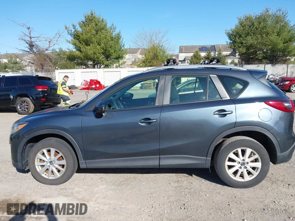 2013 Mazda CX-5 Sport z VIN JM3KE4BE3D0141748, wystawiony jako IAAI lot #41836498 z przebiegiem 163 118 mil mil oraz . Historia ofert i sprzedaży dostępna na DreamBid. Obrazek 14.