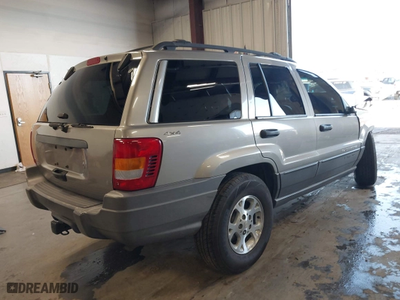 2001 Jeep Grand Cherokee Laredo with VIN 1J4GW48S01C732942, listed as a IAAI auction lot 41988918 with 205,752 mi miles. Bid and sale history available at carsss.com. Image 4.