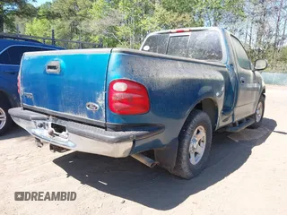 2000 Ford F-150 XL with VIN 1FTZF0722YKB38958, listed as a IAAI auction lot 42050827 with 235,315 mi miles. Bid and sale history available at carsss.com. Image 4.