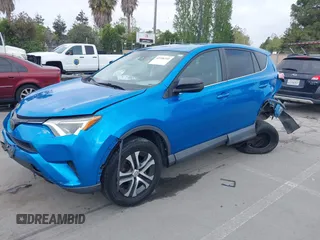 2018 Toyota RAV4 LE with VIN 2T3BFREV6JW740214, listed as a IAAI auction lot 42106349 with 105,831 mi miles and . Bid and sale history available at carsss.com. Image 19.