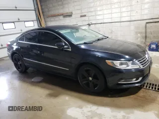 2014 Volkswagen CC R-Line with VIN WVWBP7AN7EE502537, listed as a Copart auction lot 54097165 with 120,644 mi miles and Clean title. Bid and sale history available at DreamBid. Image 4.