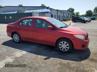2010 Toyota Corolla with VIN 2T1BU4EE5AC533817, listed as a Copart auction lot 61977715 with 101,586 mi miles and Salvage title. Bid and sale history available at DreamBid. Image 4.