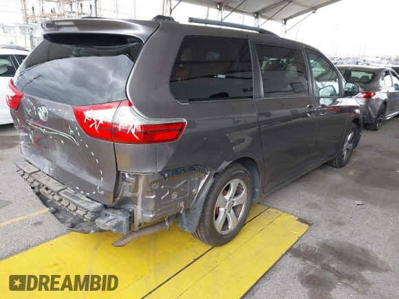 2015 Toyota Sienna LE AAS with VIN 5TDKK3DC8FS585957, listed as a IAAI auction lot 41888825 with 157,364 mi miles and . Bid and sale history available at DreamBid. Image 4.