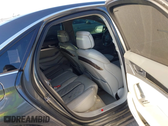 2015 Audi S8 z VIN WAUK2AFD5FN021986, wystawiony jako IAAI lot #41986491 z przebiegiem 142 073 mil mil oraz . Historia ofert i sprzedaży dostępna na DreamBid. Obrazek 8.
