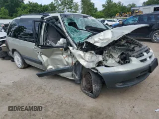 1999 Dodge Caravan with VIN 1B4GP45G7XB529075, listed as a Copart auction lot 60448215 with Not provided miles and Salvage title. Bid and sale history available at DreamBid. Image 4.