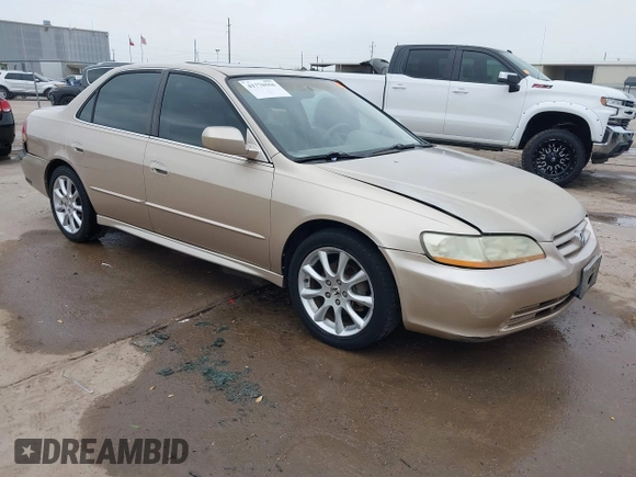 2001 Honda Accord EX z VIN 1HGCG165X1A077702, wystawiony jako IAAI lot #41770556 z przebiegiem 149 516 mil mil oraz . Historia ofert i sprzedaży dostępna na DreamBid. Obrazek 1.