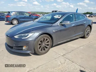 2018 Tesla Model S 75D with VIN 5YJSA1E21JF260383, listed as a Copart auction lot 61927665 with 74,644 mi miles and Salvage title. Bid and sale history available at DreamBid. Image 1.