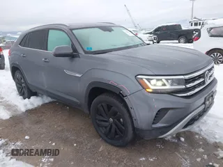 2022 Volkswagen Atlas SE z VIN 1V2KE2CA8NC227581, wystawiony jako IAAI lot #41248070 z przebiegiem 50 095 mil mil oraz . Historia ofert i sprzedaży dostępna na DreamBid. Obrazek 1.