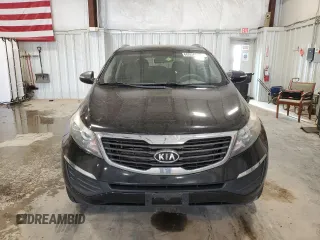 2012 Kia Sportage LX z VIN KNDPB3A24C7179584, wystawiony jako Copart lot #60938465 z przebiegiem 161 362 mil mil oraz Czysty tytuł • Clean title. Historia ofert i sprzedaży dostępna na DreamBid. Obrazek 5.