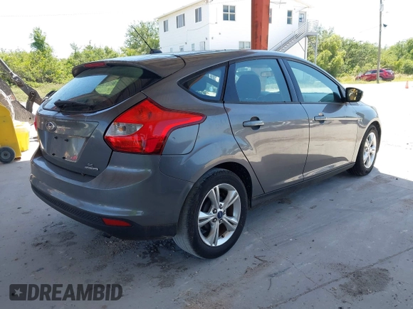 2013 Ford Focus SE with VIN 1FADP3K2XDL265306, listed as a IAAI auction lot 42029295 with 84,076 mi miles. Bid and sale history available at carsss.com. Image 4.