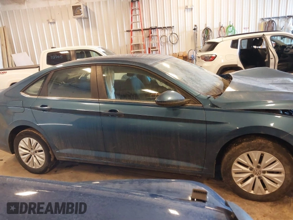 2019 Volkswagen Jetta S z VIN 3VWCB7BU9KM194136, wystawiony jako IAAI lot #41463927 z przebiegiem 103 847 mil mil oraz . Historia ofert i sprzedaży dostępna na DreamBid. Obrazek 13.