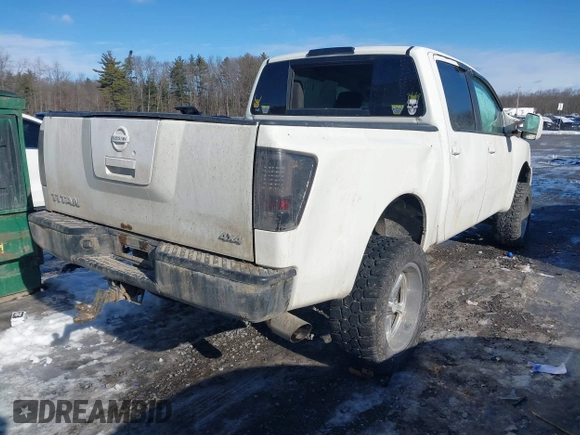 2012 Nissan Titan SV with VIN 1N6BA0EJ0CN309933, listed as a IAAI auction lot 41472091 with 147,635 mi miles. Bid and sale history available at carsss.com. Image 4.