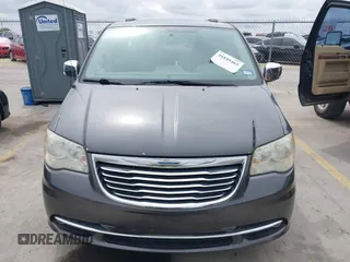 2014 Chrysler Town & Country Touring L with VIN 2C4RC1CG7ER300693, listed as a IAAI auction lot 41849463 with 174,203 mi miles and . Bid and sale history available at carsss.com. Image 12.