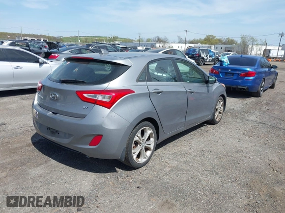 2014 Hyundai Elantra GT with VIN KMHD35LH8EU216052, listed as a IAAI auction lot 42102173 with 112,129 mi miles. Bid and sale history available at carsss.com. Image 4.