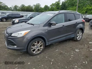 2016 Ford Escape Titanium with VIN 1FMCU9J95GUA58624, listed as a Copart auction lot 59915305 with 102,061 mi miles and Salvage title. Bid and sale history available at DreamBid. Image 1.