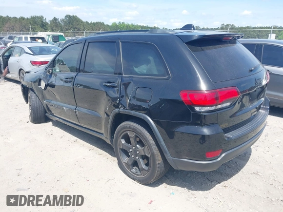 2021 Jeep Grand Cherokee Laredo E z VIN 1C4RJEAG9MC740244, wystawiony jako IAAI lot #42112847 z przebiegiem 32 897 mil mil oraz . Historia ofert i sprzedaży dostępna na DreamBid. Obrazek 3.