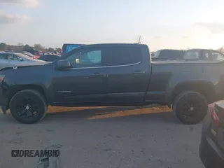 2016 Chevrolet Colorado 2WD LT z VIN 1GCGSCE37G1374901, wystawiony jako IAAI lot #41463562 z przebiegiem 163 716 mil mil oraz . Historia ofert i sprzedaży dostępna na DreamBid. Obrazek 14.