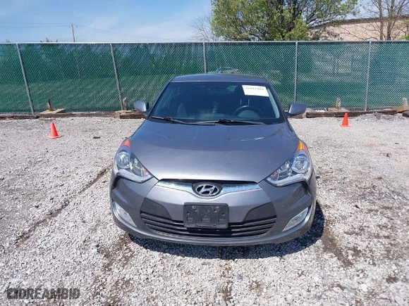 2017 Hyundai Veloster with VIN KMHTC6AD8HU305853, listed as a IAAI auction lot 41915404 with 115,663 mi miles. Bid and sale history available at carsss.com. Image 12.