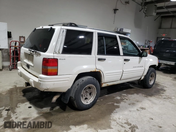 1998 Jeep Grand Cherokee Laredo with VIN 1J4GZ48SXWC183782, listed as a Copart auction lot 41700675 with 226,544 mi miles and Salvage Title. Bid and sale history available at carsss.com. Image 3.