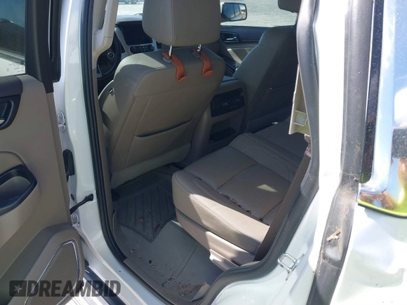 2019 GMC Yukon SLT with VIN 1GKS1BKC9KR332014, listed as a IAAI auction lot 40674460 with 76,545 mi miles. Bid and sale history available at carsss.com. Image 8.