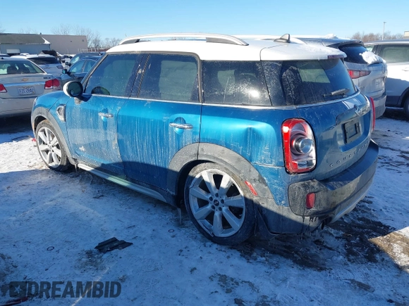 2018 MINI Countryman Cooper S with VIN WMZYT5C3XJ3E61612, listed as a IAAI auction lot 41276107 with 59,554 mi miles and . Bid and sale history available at DreamBid. Image 3.