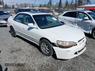 2000 Honda Accord EX z VIN 1HGCG1656YA060793, wystawiony jako IAAI lot #41884449 z przebiegiem 232 519 mil mil oraz . Historia ofert i sprzedaży dostępna na DreamBid. Obrazek 1.