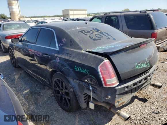 2013 Chrysler 300 SRT-8 with VIN 2C3CCAFJ9DH731557, listed as a Copart auction lot 69700344 with 174,242 mi miles and Salvage Title. Bid and sale history available at DreamBid. Image 2.