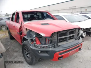 2016 Ram 1500 Rebel z VIN 1C6RR7YT8GS271446, wystawiony jako IAAI lot #41831520 z przebiegiem 74 192 mil mil oraz . Historia ofert i sprzedaży dostępna na DreamBid. Obrazek 1.