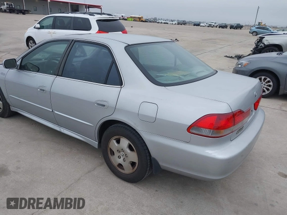 2001 Honda Accord EX z VIN 1HGCG16571A078287, wystawiony jako IAAI lot #41397391 z przebiegiem 238 239 mil mil oraz . Historia ofert i sprzedaży dostępna na DreamBid. Obrazek 3.