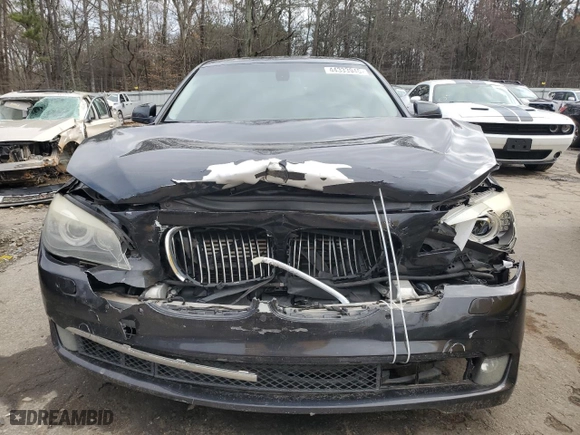 2012 BMW 7 Series 750i xDrive with VIN WBAKC6C52CC396443, listed as a Copart auction lot 44333945 with 134,075 mi miles and Salvage Title. Bid and sale history available at carsss.com. Image 5.